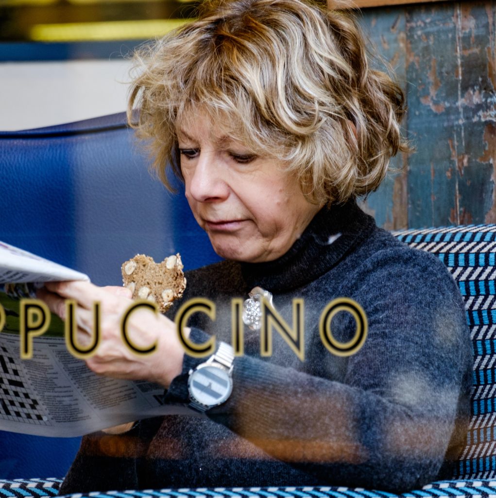 woman reading the paper