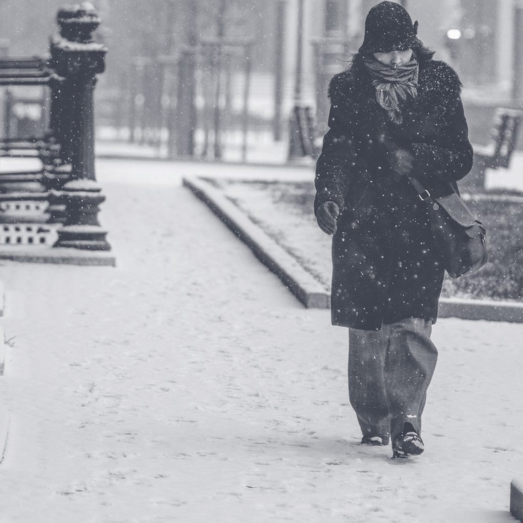 woman alone in snow